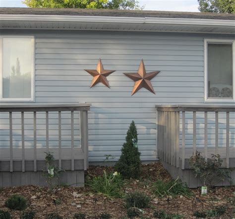 metal star for outside of house swingers|metal stars on houses.